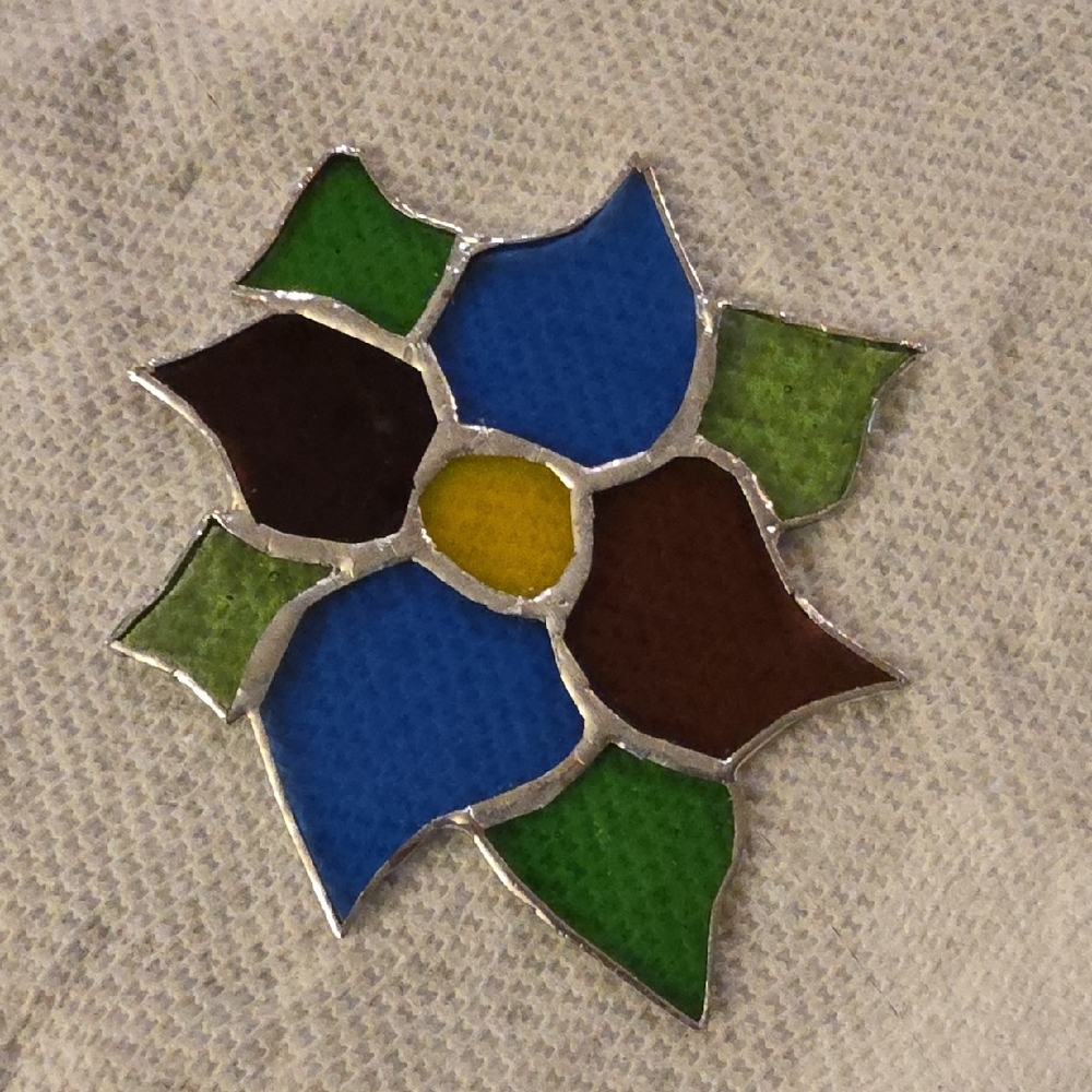 Stained Glass Flower Suncatcher Pin - Blue, Green, Brown, Yellow